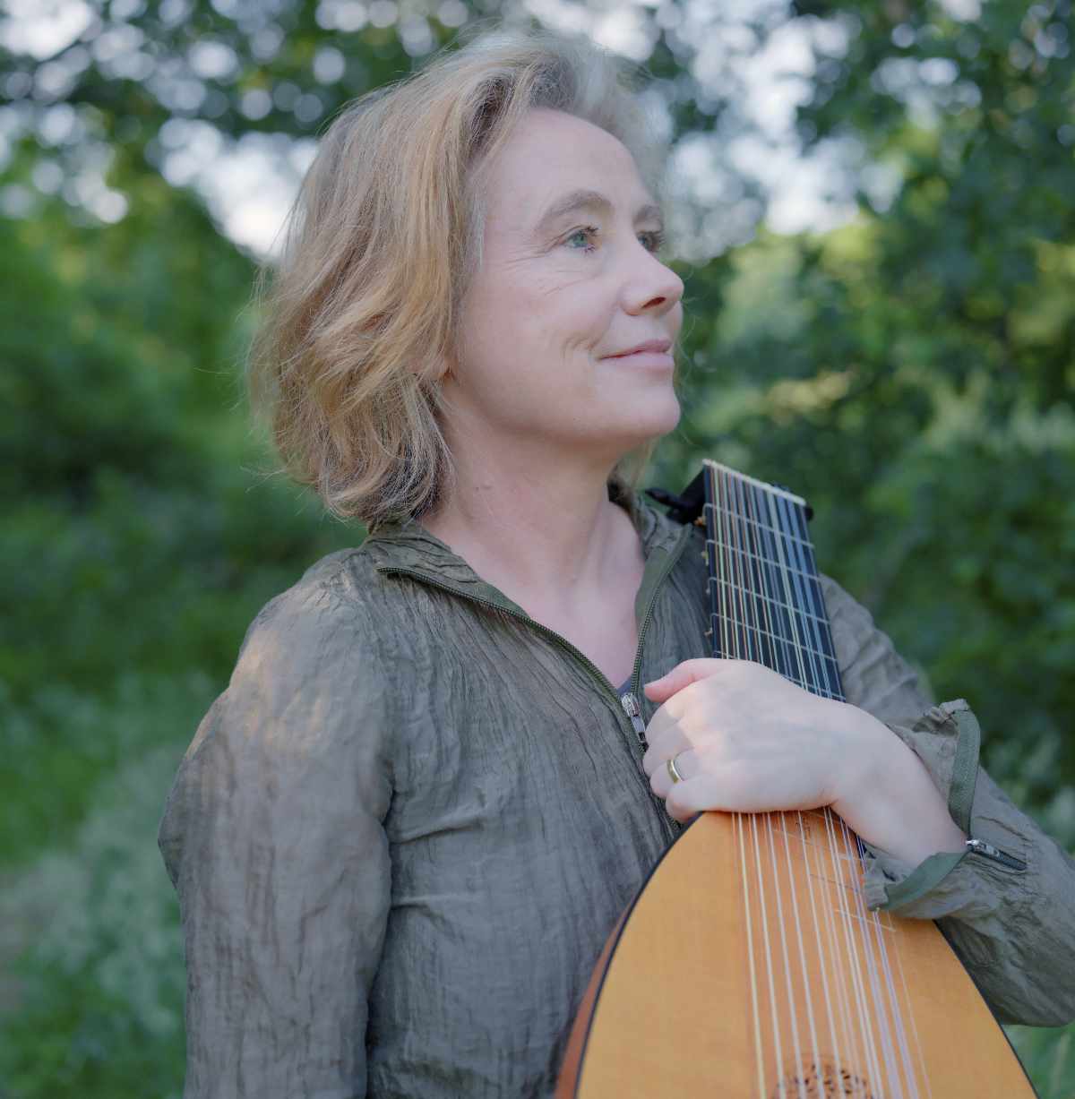 Elizabeth Kenny holding a Lute